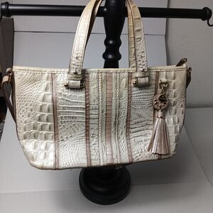 Brahmin crocodile-embossed shoulder bag in a cream and tan color scheme